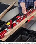 Heavy Hitting 48 Inch Precision Taper Jig For Table Saw With Dead On Accurate Angle Adjustment And Slick Extendable Support For Flawless Woodworking Cuts Made In Usa with wooden board clamped.