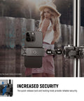 NEEWER super clamp with 5/8-inch stud and spring lock securing a smartphone on a studio mounting arm