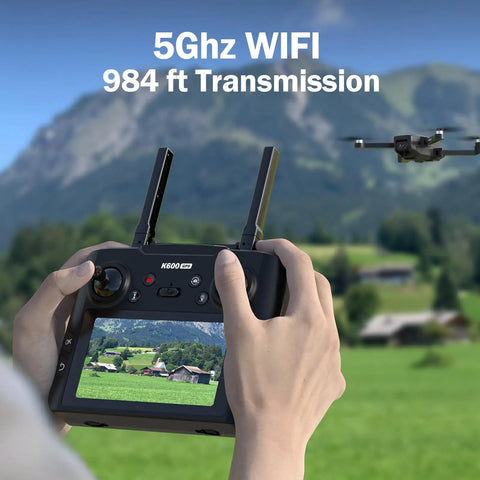 Hands holding controller with 4.5-inch LCD screen showing GPS Drone With EIS Camera And Four Point Five Inch LCD Screen On Controller.