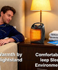 Portable Electric Space Heater That Is 2 In 1 Desk Heater And Fan on nightstand with warm glow, ideal for bedroom use