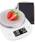 Ultra Precise Digital Kitchen Scale With LCD Display Weighs Grams Ounces Pounds Fluid Ounces And Milliliters 11 Pound Capacity White with strawberries