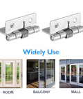 Two 1.5-inch stainless steel spring-loaded cabinet hinges, self-closing (close-up view)