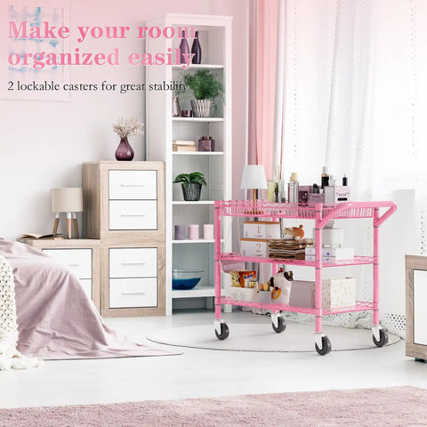Rock Solid Heavy Duty Pink Metal Rolling Cart With Three Roomy Shelves And Smooth Rolling Wheels in a stylish living room.