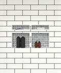 Quad Niche Recessed Shower Shelf Black With Four Inner Shelves, 32 Inch Wide By 20 Inch High By 4 Inch Deep, tiled and organized.