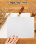 A4 Gray White Paper Mailing Envelopes Self Sealing Flat Rigid Mailers on a wooden desk with sealing tools and pampas grass
