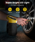 Cordless 160 PSI Tire Inflator Portable Air Pump With Digital Gauge And LED Light inflating car tire at night
