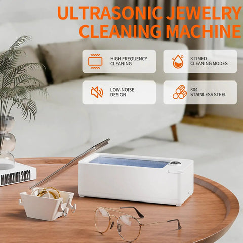 Quick Grab 50 Khz Ultrasonic Cleaner With Three Timer Settings For Bling Glasses Watches Dentures And Razors To Keep Your Daily Carry Fresh Without Any Drama Or Excess Mess Around Your Sink Area on a wooden table.