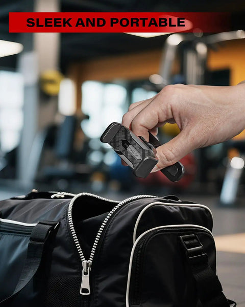 Person holding Magnetic Gym Phone Holder With Alloy Base and Joint above a gym bag, demonstrating portability and design.
