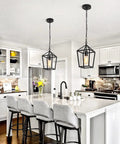 Black 1 Light Pendant Light With Adjustable Chain for kitchen island in modern white kitchen, industrial wire frame style