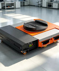 Built Like A Tank Heavy Duty High Capacity Electric Transfer Cart With One Touch Remote Control Featuring Trackless Design For Rugged Workshop Floors Industrial Hauling, showcasing a thick steel deck and swivel top.