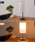 Set Of 2 Bedside Table Lamps For Bedroom And Living Room With 3 Way Dimmable Rocker Switch And Built In AC Outlet Flaxen Fabric Shade Black Base Nightstand And Desk Lamp For Cozy Home Decor, shown in day and night setting on wooden desk