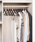 Solid Wood Hangers 20 Pack With Smooth Walnut Finish Non Slip Pant Bar 360 Degree Swivel Hook in closet with various garments