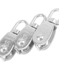 Three 20 Piece M15 Stainless Steel Single Pulley Blocks For Lifting And Towing in durable silver finish with swivel hooks
