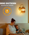 Slick Vintage Gold Wireless Wall Sconces Set Of Two Rechargeable Battery Operated Lights With Amber Stripe Glass Shades and Remote in a cozy bedroom.