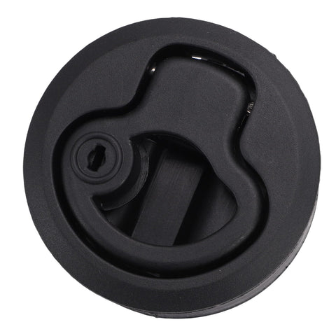 Close-up of black flush-mount round boat hatch latch with locking lever and keyhole