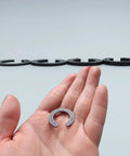 Person holding a piece from Refrigerator Door Hinge Shim Height Adjustment Kit Four Thicknesses Replacement Parts Set For Samsung And Other Brand Refrigerators