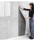 Peel And Stick White Brick Wallpaper 3D Wall Covering With Slick XPE Backing For A Zero Sweat Install, woman applying wallpaper.