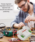 Man using Electric Wire Welding Fixture Clamp Adjustable Soldering Jig For Precise Alignment In MIG TIG And Spot Welds Heat Resistant Insulation Durable Pro Grade Workhorse Easy Setup For Shop Pros Green White Finish on electronics workspace.