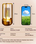 Portable Metal Table Lamp With 4000mAh Rechargeable Battery Cordless Outdoor Light next to phone for size comparison