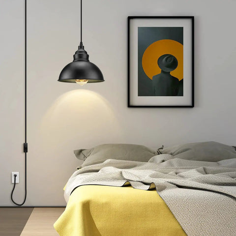 Premium Plug In Pendant Light With Fifteen Foot Drop Cord and Smooth Switch above a bed with cozy yellow and gray bedding.