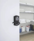 SmartCode 955 Pembroke 10 Button Keypad Electronic Lever on commercial storage door in matte black finish