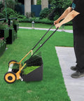 14 Inch Manual Push Reel Lawn Mower With Collection Bag And Sweeper For Easy Yard Work No Fuss 4 Sharp 5 Edged Blades For Lawns Gardens Yards Parks Golf Courses Sidewalks Driveways, side view on lawn