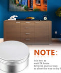 Clear Chalk Paint Wax Kit with jar and brush, shown in a living room next to a wooden cabinet, note about drying time.