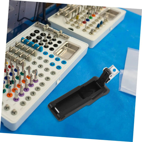 Two Piece Flexible Draw Latch with fixing bracket next to a dental tool set. Ideal for boat compartments and automotive storage cabinets.