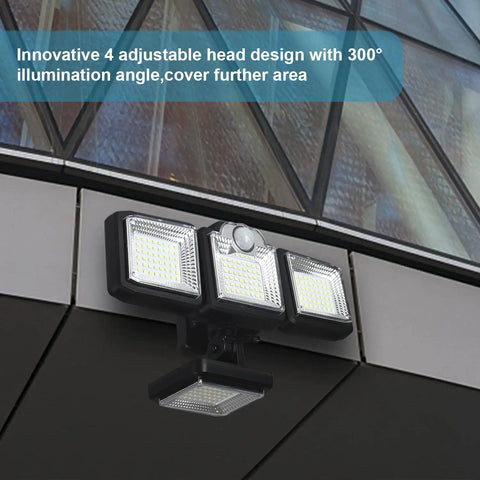 Solar Outdoor Motion Sensor Flood Light With Remote Control mounted on building exterior with four adjustable LED heads