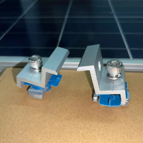 Heavy Duty Two Hole End Clamps For Solar Panel Mounting Fits 30 And 35Mm Pv Modules Includes Groove Nuts And Bolts For A Hassle Free Strut Channel Setup Pack Of Ten close-up of two clamps on a surface