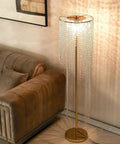 Raindrop Crystal Floor Lamp With French Gold Finish Sparkling Glass Bead Lighting For Bedroom Or Living Room next to sofa