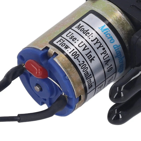 Close-up of Compact DC 24V 3W Ink Pump for Printers and Inkjets showing model details and compatibility with airbrush systems