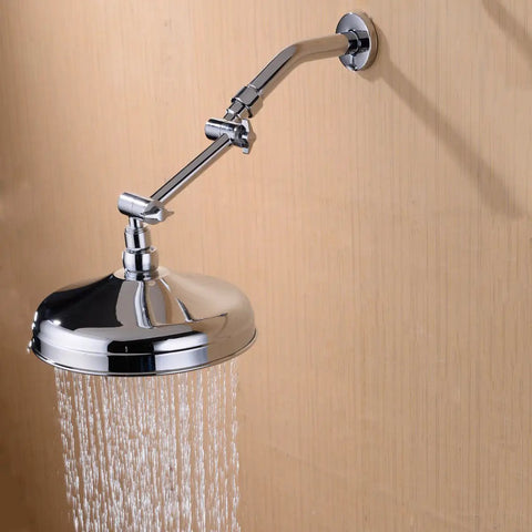 4 Inch Brass Shower Arm Extension With Adjustable Height Mount For Shower Head Chrome Finish Heavy Duty Build Half Inch NPT Male To Shower Head And Half Inch IPS Female To Arm, installed with water flowing from shower head.