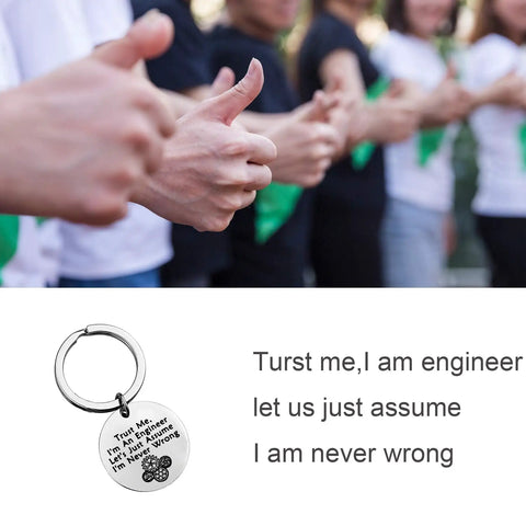 Trust Me I Am An Engineer Keychain With Gear Design, displayed with engineers giving thumbs up, stainless steel charm