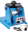 Heavy Duty Rotary Welding Positioner With Sturdy Three Jaw Chuck And Smooth Zero To Ninety Degree Tilt For No Sweat Seam Welding Runs, blue metal frame with control panel.