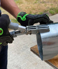 Person using Five Blade Sheet Metal Crimping Tool With Soft Grip Handles And Safety Lock on duct.