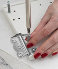 Installing Three Pack Self-Closing Door Hinges Stainless Steel Spring Loaded 2.7 Inch For Exterior Doors on a white panel.