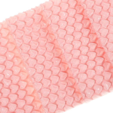 Close-up of Cute Pink Heart Bubble Mailers 50 Pack Lightweight Cushioning Protective Envelopes for Jewelry and Small Gifts