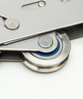 Close-up of a Tandem Patio Door Roller With Stainless Steel Sealed Bearings And 1.25 Inch Wheels For Wood And Vinyl Doors