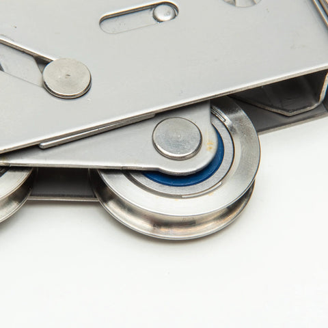 Close-up of a Tandem Patio Door Roller With Stainless Steel Sealed Bearings And 1.25 Inch Wheels For Wood And Vinyl Doors