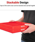 Man holding red stackable trays illustrating storage solution with printed text 'Stackable Design'.
