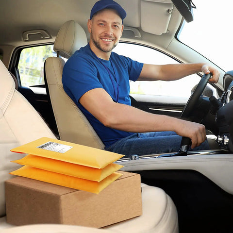 Delivery driver with Yellow Kraft Bubble Mailers 25 Pack Self Sealing Padded Envelopes 10.5 By 16 Inch Outer Size in car seat
