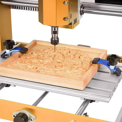 CNC machine with wood carving, secured by Hold Down Clamp Kit for CNC Routers and Woodworking, No Slip Grippy T Track Clamps 23x30mm Fit, 2 Pack Blue