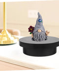 Electric Rotating Jewelry Display Turntable Motorized Showcase Stand For Photography Props With Rechargeable Battery on a mini black rack.