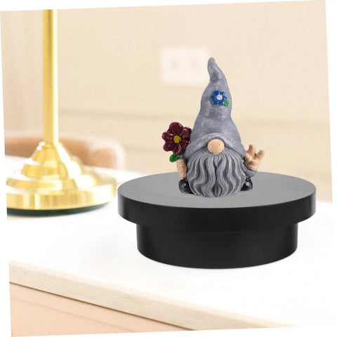 Electric Rotating Jewelry Display Turntable Motorized Showcase Stand For Photography Props With Rechargeable Battery on a mini black rack.
