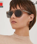Person wearing Bio Based Square Sunglasses For Men And Women Non Polarized Brown Lens Includes Official Eyewear Kit Ideal For Formal And Casual Wear Durable Frame All Day Everyday Comfort