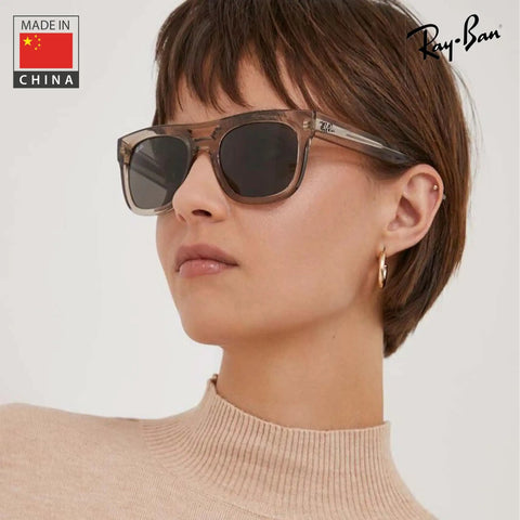 Person wearing Bio Based Square Sunglasses For Men And Women Non Polarized Brown Lens Includes Official Eyewear Kit Ideal For Formal And Casual Wear Durable Frame All Day Everyday Comfort