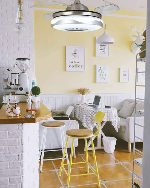 Retractable Ceiling Fan With Light And Bluetooth Speaker, Silent Motor LED Chandelier Style, in modern kitchen dining area.