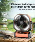 Camping Fan With Light 20000mAh Battery With USB Charging, 112 Hours Run Time On Low, 9 Speed Settings displayed outdoors