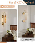 Amber Glass Wall Sconce With Brass Tube, 1 Light Modern Mid Century Vanity Fixture on and off in bedroom setting